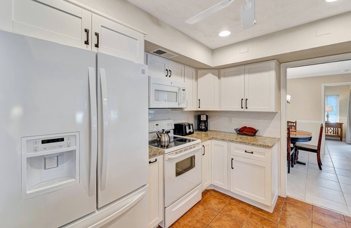 Venice Gardens House | Spacious lakeside home with modern kitchen, heated pool, and central AC