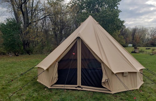 Dale RV Rental | Spacious luxury tent in quiet country setting.