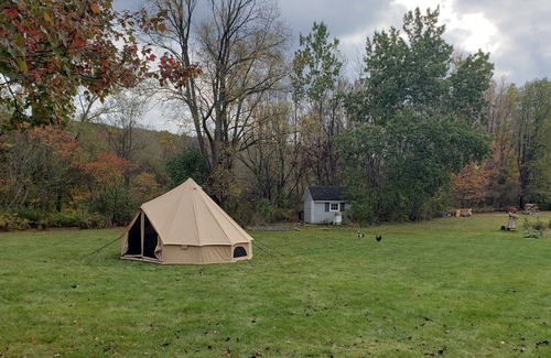 Dale RV Rental | Spacious luxury tent in quiet country setting.