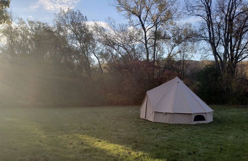 Dale RV Rental | Spacious luxury tent in quiet country setting.