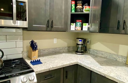 Paradise Estates House | Spacious Modern Cabin! 5mi to Park w/Hot Tub & Wifi