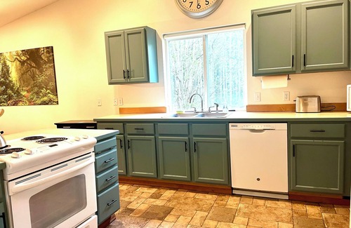 Shelton House | Spacious one level home with a firepit, hot tub and games
