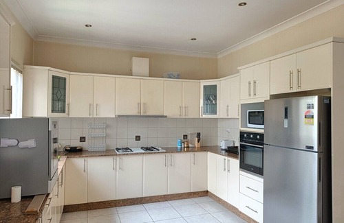 Merrylands House | Spacious Room with Balconyn