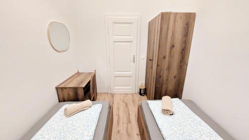 Erdberg House | Spacious Rooms - 15 Min from Airport & City Center, 5 Min from Vienna Main-Bus Station EZ 42