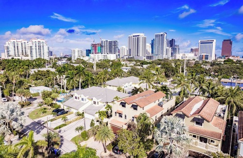 Sailboat Bend House | Spacious townhouse in downtown with rooftop terrace, heated pool, and king bed