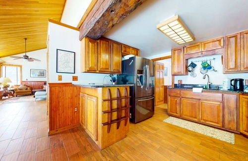 Gilford House | Spacious, two-story home with a hot tub, washer/dryer, & mountain views