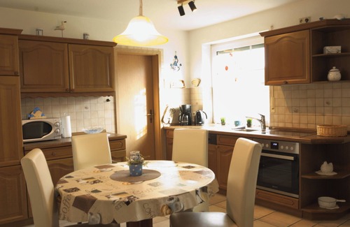 Norddeich House | Spacious vacation home close to the beach in Norddeich with garage, terrace and beach chair