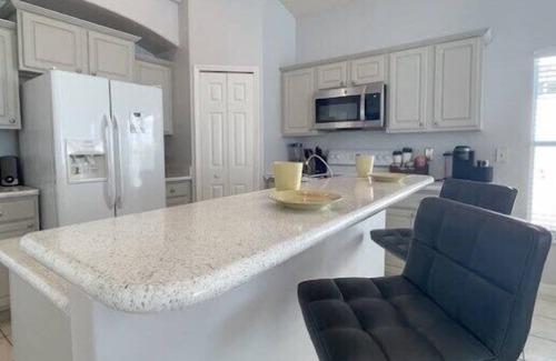 Four Corners House | Spacious Villa with Pool, spa & Game Room