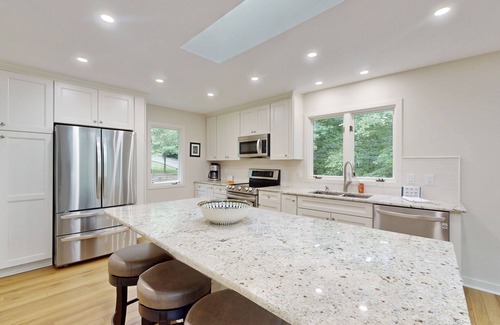 Morgan II House | Spacious waterfront escape with screened porch, water slide, kayak, & games