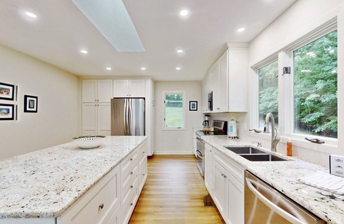 Morgan II House | Spacious waterfront escape with screened porch, water slide, kayak, & games