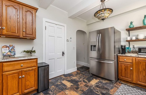 Dubuque House | Spanish Revival 1920 Home in Quiet Neighborhood
