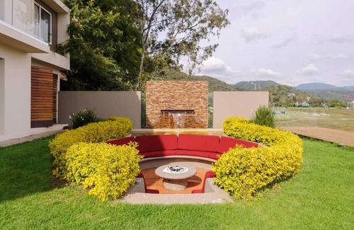 El Santuario House | Spectacular lakefront home with pool