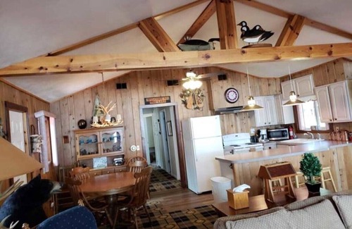 Higgins Lake Cabin | Spectacular Lakefront Cabin w/boat mooring on Higgins Lake Sleeps up to 8 people
