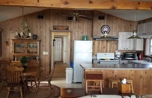 Higgins Lake Cabin | Spectacular Lakefront Cabin w/boat mooring on Higgins Lake Sleeps up to 8 people