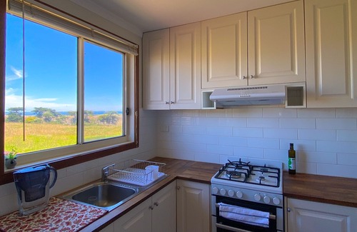 Coronet Bay House | Spectacular ocean, mountain and farm views at Karinya Beach House