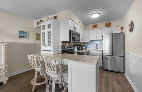 Duck Condo | Spectacular ocean views from two private balconies with cheerful decor close to town of Duck