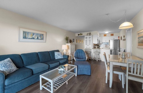 Duck Condo | Spectacular ocean views from two private balconies with cheerful decor close to town of Duck