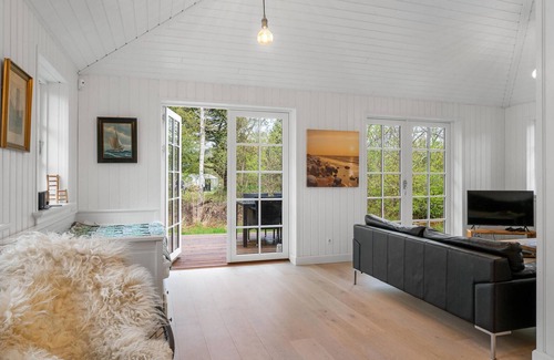 Ordrup House | Spend a nice vacation in this modern and spacious vacation in Ordrup.