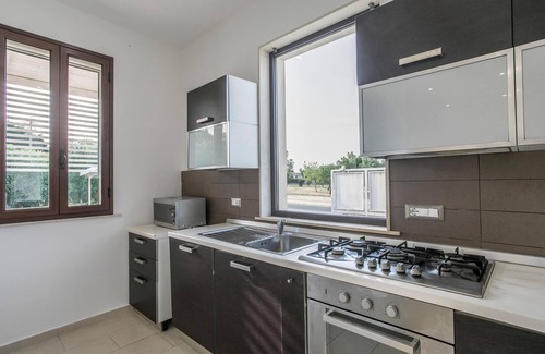 Brucoli House | Spend a wonderful vacation with the family in this comfortable pool holiday home.