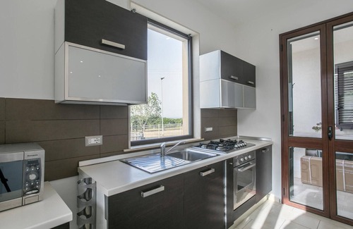 Brucoli House | Spend a wonderful vacation with the family in this comfortable pool holiday home.