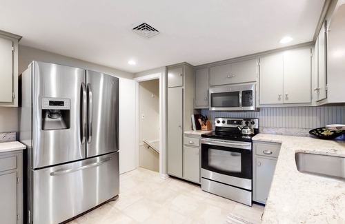Falmouth House | Split-level home near the beach with WiFi, furnished deck & central AC