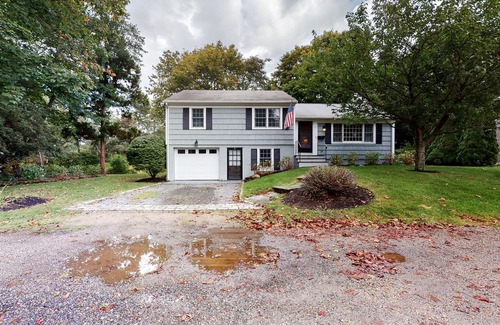 Falmouth House | Split-level home near the beach with WiFi, furnished deck & central AC