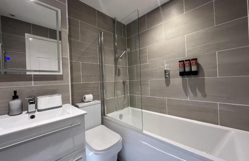 Stevenage House | Spotless Two-Bedroom Home with Garden and Parking
