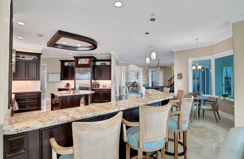Edgewater House | Sprawling intercoastal home with boat lifts, pool and hot tub