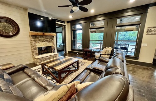 Gainesville House | Sprawling Lake Oasis with Pool, Hot Tub, Dock, Firepit, Gym