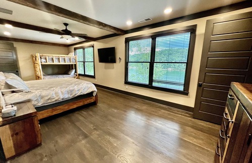 Gainesville House | Sprawling Lake Oasis with Pool, Hot Tub, Dock, Firepit, Gym