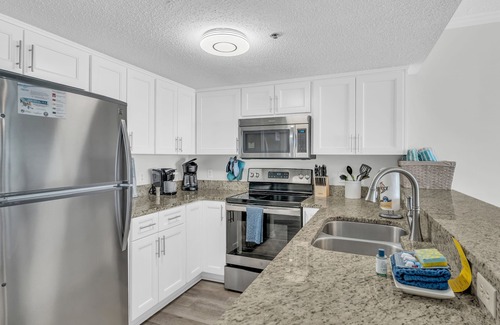 Ono Island Condo | Spring into Tropical Winds #703!