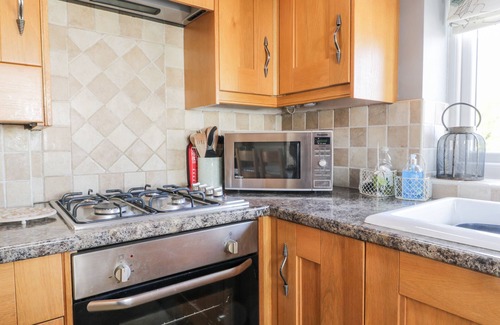 Briggswath Cottage | STABLE COTTAGE, pet friendly, with a garden in Fylingdales