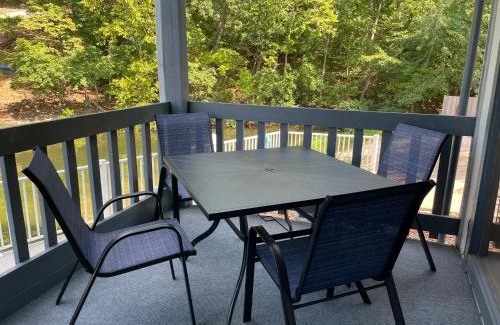 Osage Beach Apartment | STAIRS OPTIONAL! Lakefront! Pool! On Water! Convenient Fishing!
