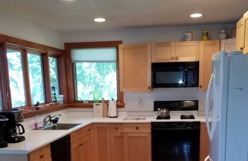 Gloucester House | Stanwood Point: Waterfront cottage with large screened porch, yard and dock