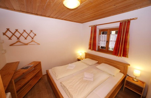 Hochkrimml Apartment | Staudi's ski hut vacation apartment Top1 in hut style directly on the slopes Stove