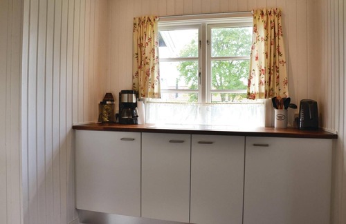 Kirke Hyllinge House | Stay close to the fjord in this cozy cottage that is perfect for relaxation and socializing.