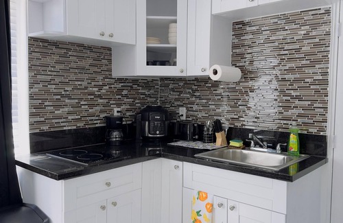 Miami Beach Apartment | Stay in Mid Miami beach just 1 block from the beach! Parking space included!
