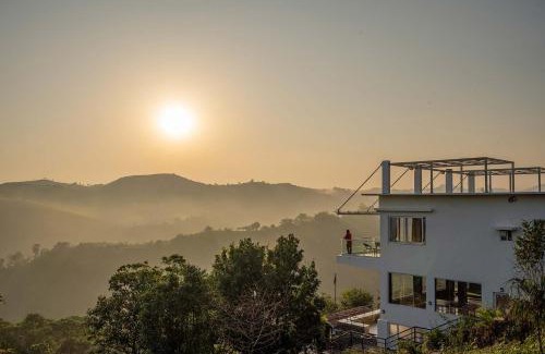 Elappara Villa | StayVista at Ozone Greens view of the unending Slopes and Valleys