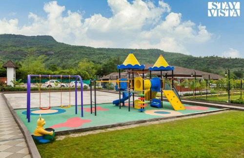 Karjat Villa | StayVista's Ashwamedha Manor - Mountain-Side Luxury Retreat with Outdoor Pool, Jacuzzi, Spa & Steam Room, and Indoor Activities