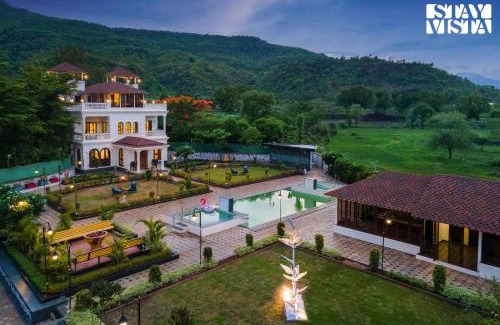 Karjat Villa | StayVista's Ashwamedha Manor - Mountain-Side Luxury Retreat with Outdoor Pool, Jacuzzi, Spa & Steam Room, and Indoor Activities