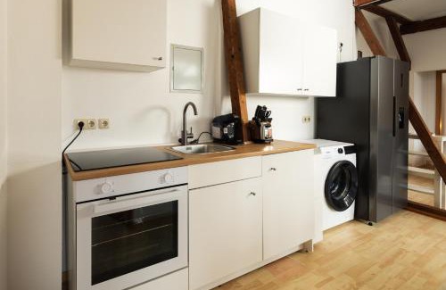 Tempelhof Apartment | Staywell am Tempelhofer Hafen - Suite mit Terrasse