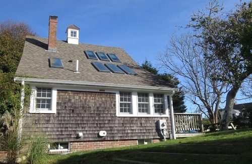 Chatham House | Step back in time in this beautifully maintained antique horse barn cottage!