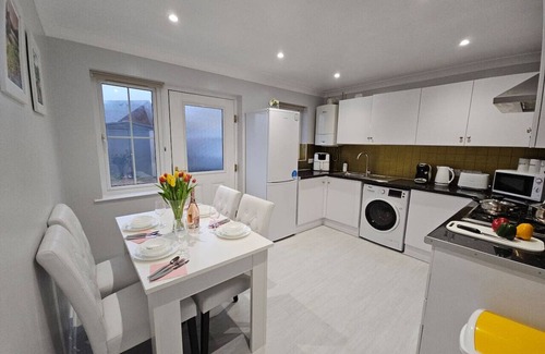 Port Talbot House | Step-free retreat by the sea with garden & parking