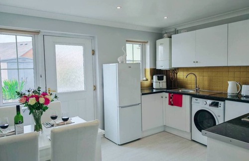 Port Talbot House | Step-free retreat by the sea with garden & parking