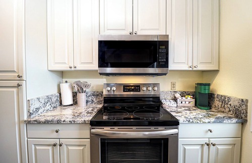Grand Lake Apartment | Steps away from shops and restaurants! Pet friendly with gorgeous views!