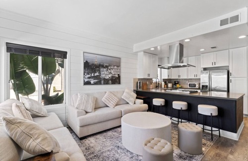 Newport Center Condo | Steps to Lido Village and the Marina- Heart of Lido Island, 2 Car Garage!