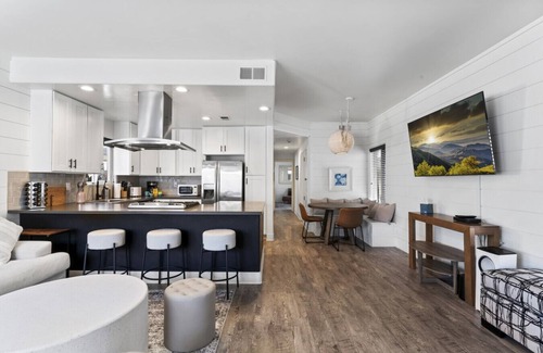 Newport Center Condo | Steps to Lido Village and the Marina- Heart of Lido Island, 2 Car Garage!