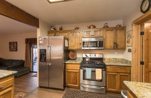 Summit Estates House | Steps to Summit! Indoor Spa. Fireplace. Nice Deck.