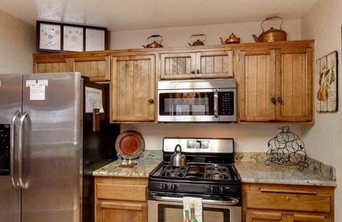 Summit Estates House | Steps to Summit! Indoor Spa. Fireplace. Nice Deck.