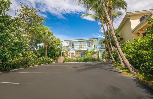 Juno Beach House | Steps to the Beach. Prime Location. Beach Bungalow Chic.